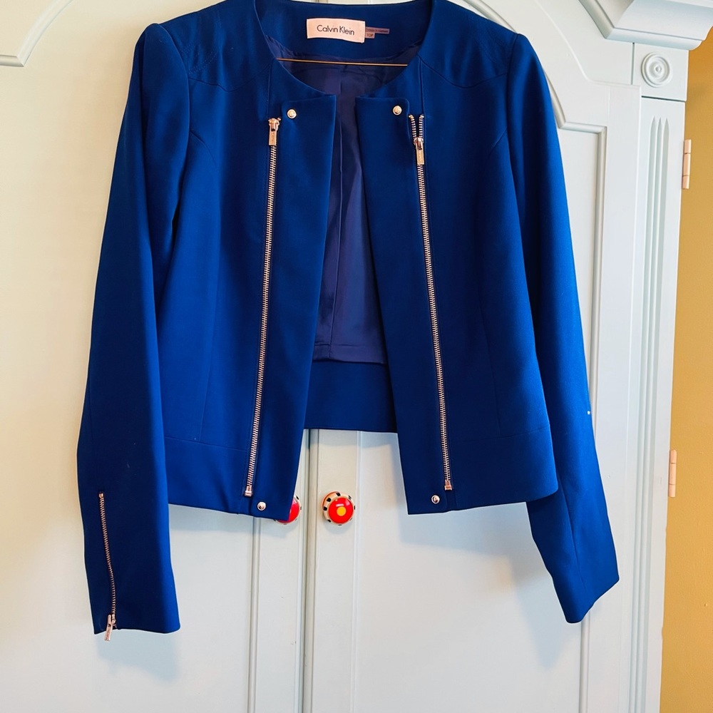 Closing closet soon. Calvin Klein blue jacket